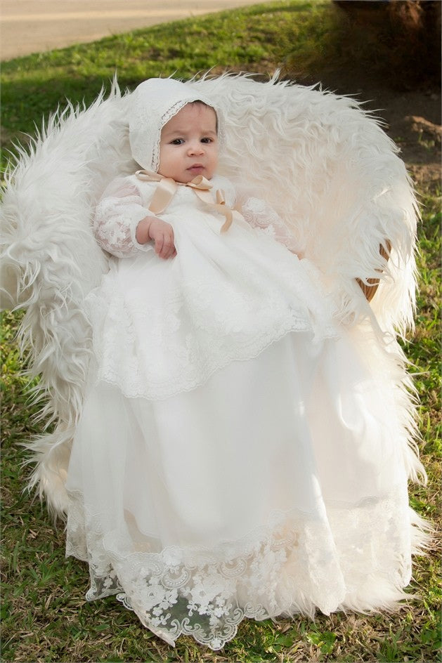 Christening gown for baby, white, richly decorated with lace with hat and booties
